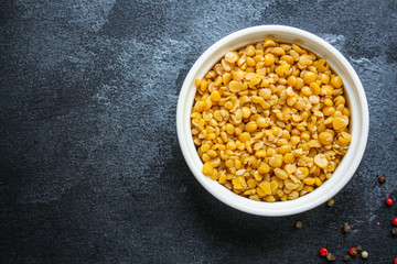 dry peas boiled porridge healthy food (meat product sausage) menu concept background. top view. copy spaces