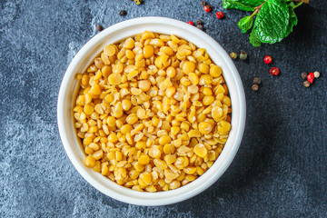 dry peas boiled porridge healthy food (meat product sausage) menu concept background. top view. copy spaces