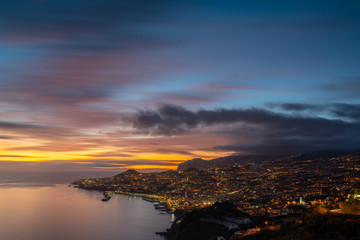 Fototapeta na wymiar Funchal with a long exposure during a colorful sunset