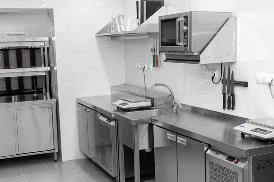 Design Of The Working Area Of The Commercial Cafe Kitchen With Stainless Steel Equipments, Hot Shop, Food Industry.