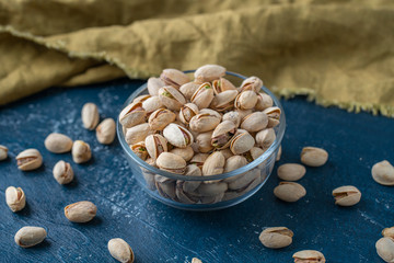 Roasted And Salted Pistachios In Glass Bowl