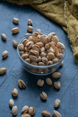 Roasted And Salted Pistachios In Glass Bowl