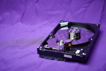 Opened hard drive from the computer hdd disk drive with mirror effects. Disassembled hard drive...