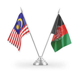 Afghanistan and Malaysia table flags isolated on white 3D rendering