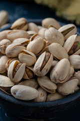 Roasted And Salted Pistachios In Ceramic Bowl