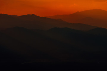 Scenic View Of Silhouette Mountains Against Sky During Sunset and beam
