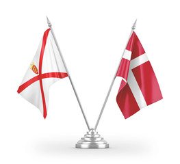 Denmark and Jersey table flags isolated on white 3D rendering