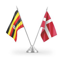 Denmark and Uganda table flags isolated on white 3D rendering