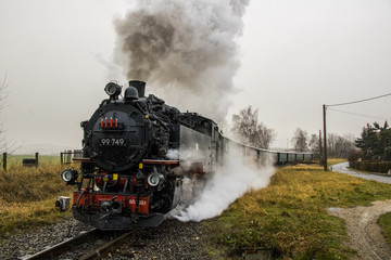 Plakat saxon steam locomotive during advent rides,