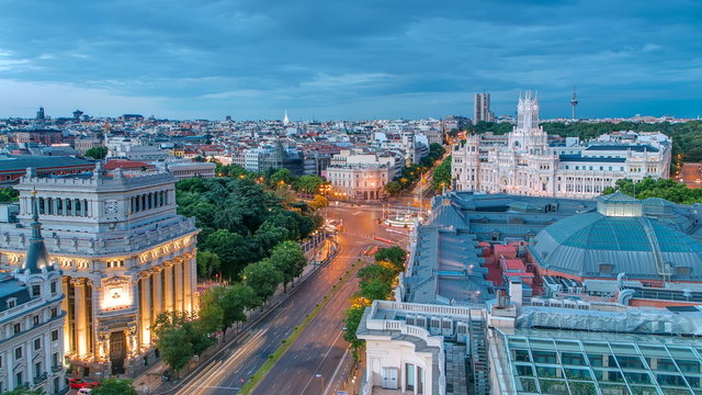 Madrid day to night timelapse, Beautiful Panorama Aerial View of Madrid Post Palacio comunicaciones, Plaza de Cibeles, Prueba, Banco de Espana, Calle de Alcala, Spain