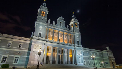 Fototapeta na wymiar Santa Maria la Real de La Almudena in night timelapse hyperlapse - Cathedral in Madrid, Spain