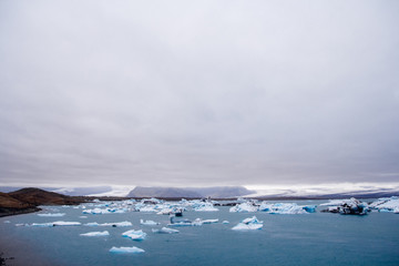 Icebergs in Jokulsarlon lagoon beneath Breidamerkurjokull glacier Sudhurland, Iceland. Place for...