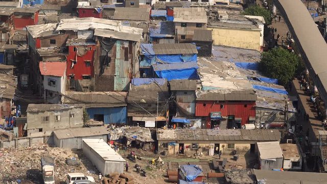 Slums of Mumbai, India. Closeup with people.