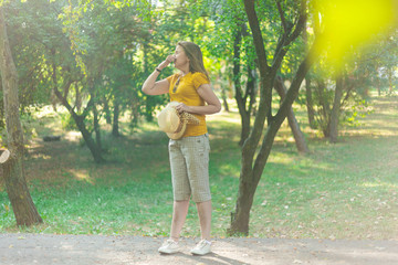 Woman with pollen allergy being outside in nature