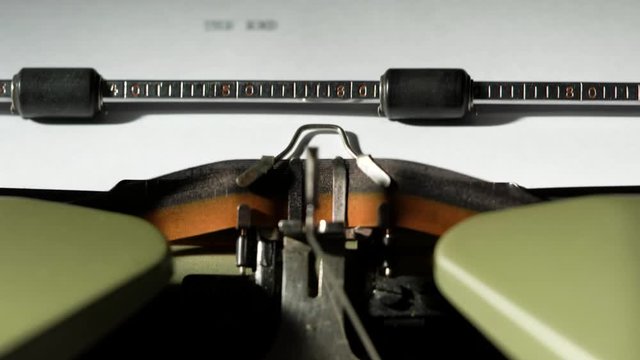 INVESTIGATION written on old green vintage retro typewriter