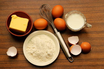 Baking ingredients for pancakes or sponge cake.