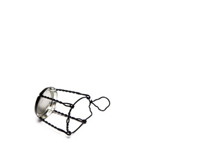 Champagne black metal cork cell on a white background.