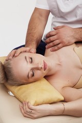 Obraz na płótnie Canvas Massage of the head and cervical spine with an osteopath