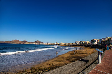 warm beach landscape in the capital on the Spanish Canary Island Gran Canaria on a clear day
