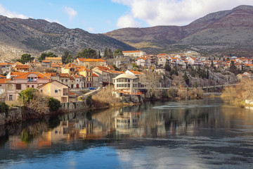 Fototapeta na wymiar View of Trebisnjica river and Trebinje city on winter day. Bosnia and Herzegovina, Republika Srpska