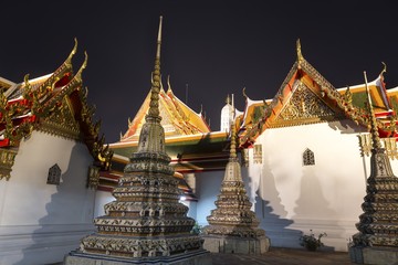 Spires of Wat Pho or Wat Phra Chetuphon Buddhist Temple Complex, also known a Temple of the...