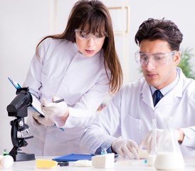 Two lab doctor testing food products