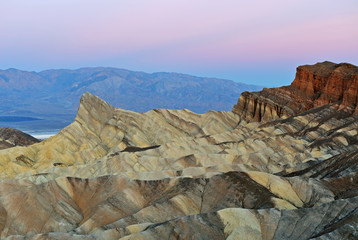 Landscape at dawn, Golden Canyon and Panamint Mountains from Zabriskie Overlook, Death Valley National Park, California, USA