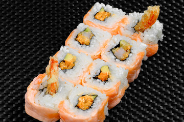 Japanese rolls on a dark textured background