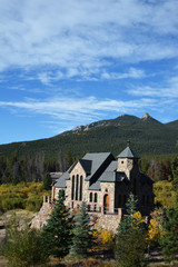 Stone Church surrounded with aspen and pine forest.
