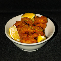 Fried squid with lemon slices