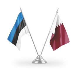 Qatar and Estonia table flags isolated on white 3D rendering