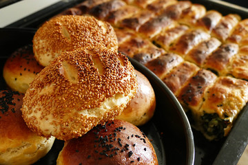 homemade hot spinach pie, crispy and sesame buns,