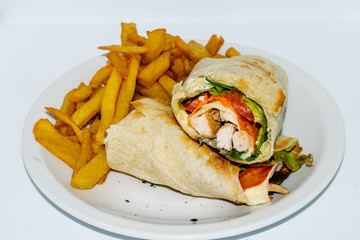 Chicken wraps with french fries.