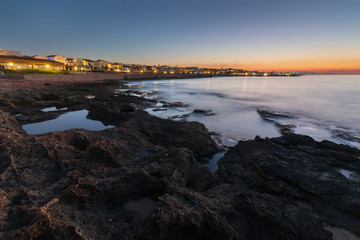 Panoramic view on the beach in Crete in the evening. Long exposure.
