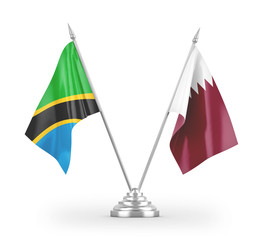 Qatar and Tanzania table flags isolated on white 3D rendering