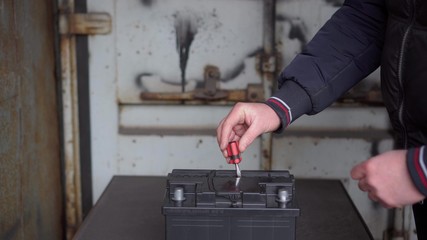 Car service battery maintenance, diagnostics.