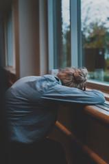 Woman resting her head
