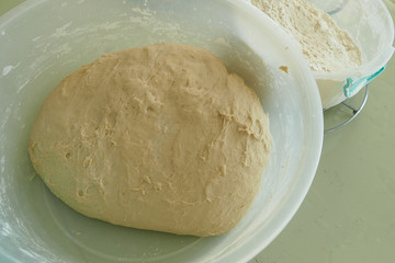 fermented yeast dough, dough and kneaded dough ready to make bread,