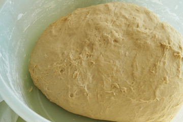 fermented yeast dough, dough and kneaded dough ready to make bread,