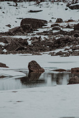 Rock in a river bend
