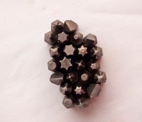 tips of a group of  head screwdriver bits isolated on a white background