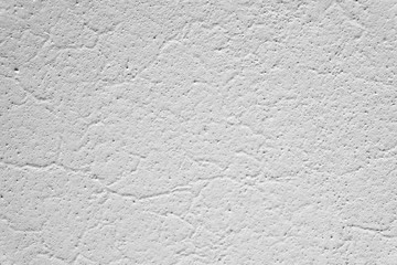 uneven texture of old whitewash on the ceiling.
