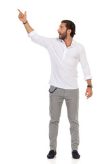 Handsome Man Pointing Up And Talking