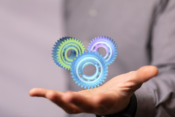 Business, Internet and technology concept. Business select gear icon on virtual screen.