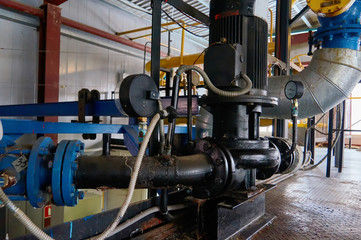 Engine with pump and manometer on the pipeline.
