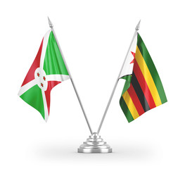 Zimbabwe and Burundi table flags isolated on white 3D rendering