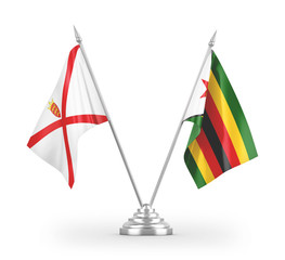 Zimbabwe and Jersey table flags isolated on white 3D rendering