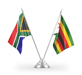 Zimbabwe and South Africa table flags isolated on white 3D rendering