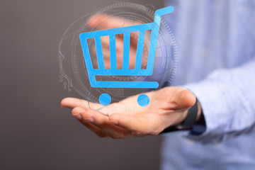 Businessman pressing modern technology panel shopping cart web phone credit card.