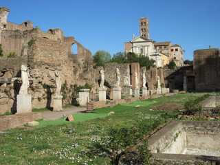 The House of the Vestal Virgins located in the Roman Forum in Rome, Italy on a sunny day with blue sky 